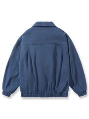 製品画像: マルチポケットワークジャケットのウォッシュドコットン素材フロントビュー
詳細画像: ジッパーデザインとワークポケットのディテール特写