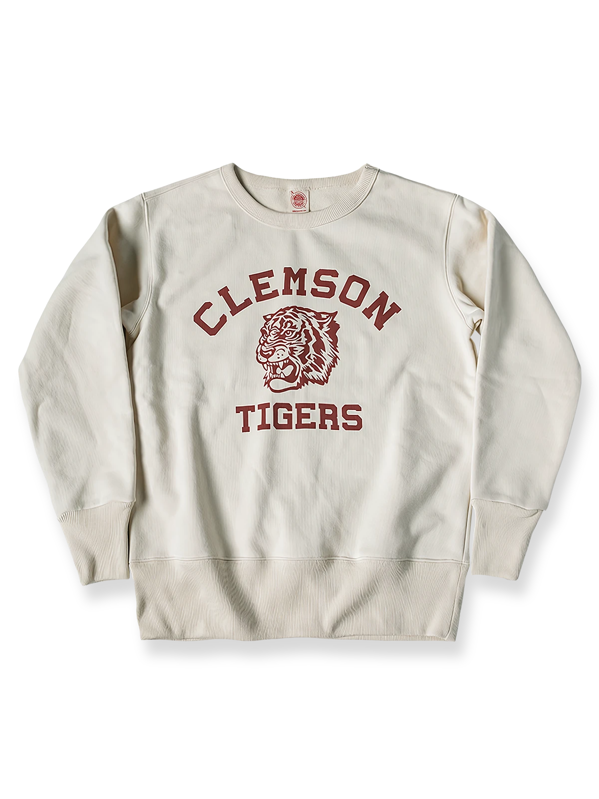 クレムソンタイガープリントスウェットの全体正面画像、クラシックプリントとリブ袖口のディテール。