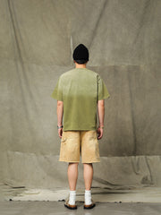 モデルが着用したヴィンテージ加工ワークショーツの展示図