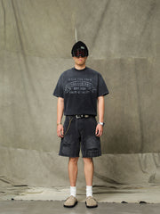 モデルが着用したヴィンテージ加工ワークショーツの展示図