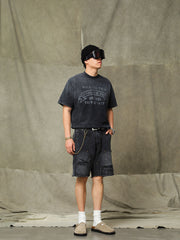 モデルが着用したヴィンテージ加工ワークショーツの展示図