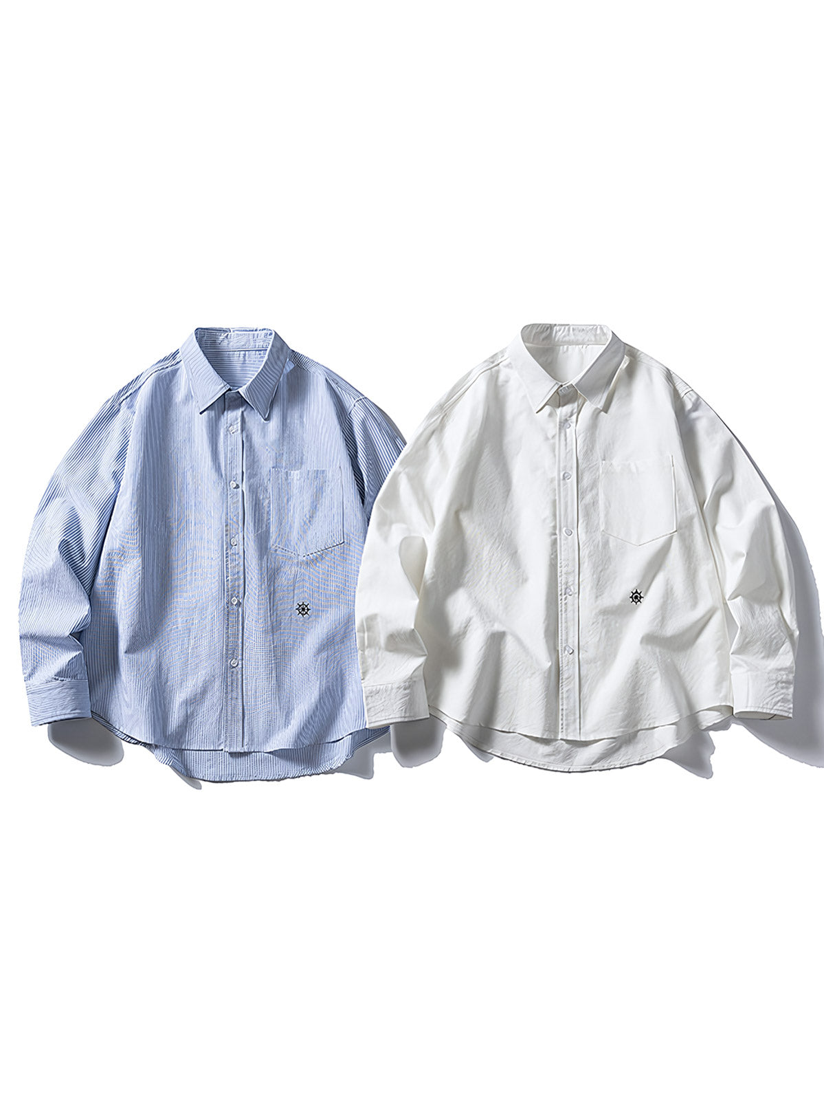 製品画像
「クラシックなブルーストライプと精巧な舵の刺繍を施した長袖シャツの全体展示図。ヴィンテージ感とエレガンスを兼ね備えたデザインが特徴。」
詳細画像
「小さくて精巧な舵刺繍ディテールの特写。航海テーマを表現した刺繍がヴィンテージ感を引き立て、デザイン性と機能性を兼ね備えています。」