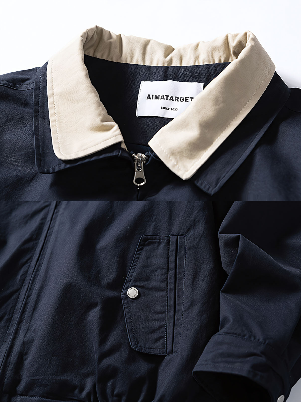 製品画像
「レトロなワークウェア風デザインとパッチワーク襟、レイヤードデザインを採用したワークジャケット全体の展示図。高密度のワークウェア生地が耐久性と防風性を提供し、モダンなトレンドとクラシックなデザインが融合。」
詳細画像
「バイカラーパッチワーク襟と耐久性の高い金属ジッパーのディテール特写。視覚的なコントラストを強調し、細部にわたる高品質の仕上がりが見て取れる。」