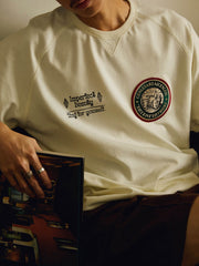 刺繍 ラグラン バッジ付き半袖Tシャツ