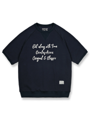 アメリカンレトロスタイルのワッフル格子模様のラグランスリーブ半袖Tシャツの正面ビュー。ネックラインに三角形の補強が施され、レトロなデザインが際立っています。