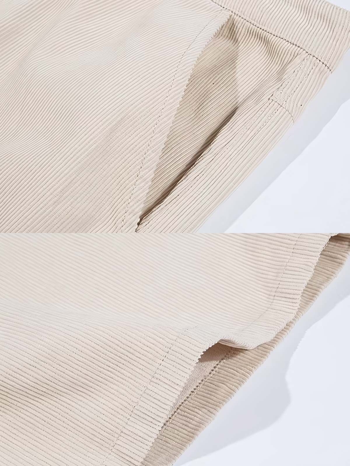 製品画像: 14ウェールのコットンコーデュロイ素材を使用したワイドパンツの全体画像。柔らかな肌触りと自然なドレープ感が魅力的で、通勤やカジュアルシーンにぴったりの一着。
詳細画像: コーデュロイ素材のディテールと裾デザインを映したクローズアップ画像。製品染め加工による深みのあるカラーと、ワイドシルエットの滑らかなラインが際立つ。