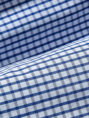 製品画像: リバーシブルデザインとヴィンテージチェック柄が融合した美式ヴィンテージスタイルのハリントンジャケット全体展示、100%コットン素材で快適な着心地
詳細画像: 袖口のバイカラー折り返しデザインとリバーシブルデザインのディテール、ヴィンテージチェック柄と単色面が交互に見える部分のクローズアップ