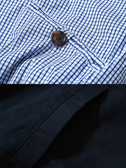 製品画像: リバーシブルデザインとヴィンテージチェック柄が融合した美式ヴィンテージスタイルのハリントンジャケット全体展示、100%コットン素材で快適な着心地
詳細画像: 袖口のバイカラー折り返しデザインとリバーシブルデザインのディテール、ヴィンテージチェック柄と単色面が交互に見える部分のクローズアップ