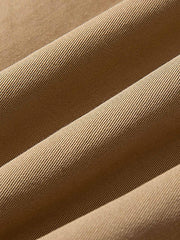 製品画像: ドレーピング(立体裁断)技法を活かしたスタンドカラーのワークジャケット全体展示、サンドウォッシュ加工とコーマコットン素材を使用したヴィンテージ感のあるデザイン
詳細画像: ドレーピングカットによる立体感、スタンドカラーのディテール、大容量ポケットのクローズアップ