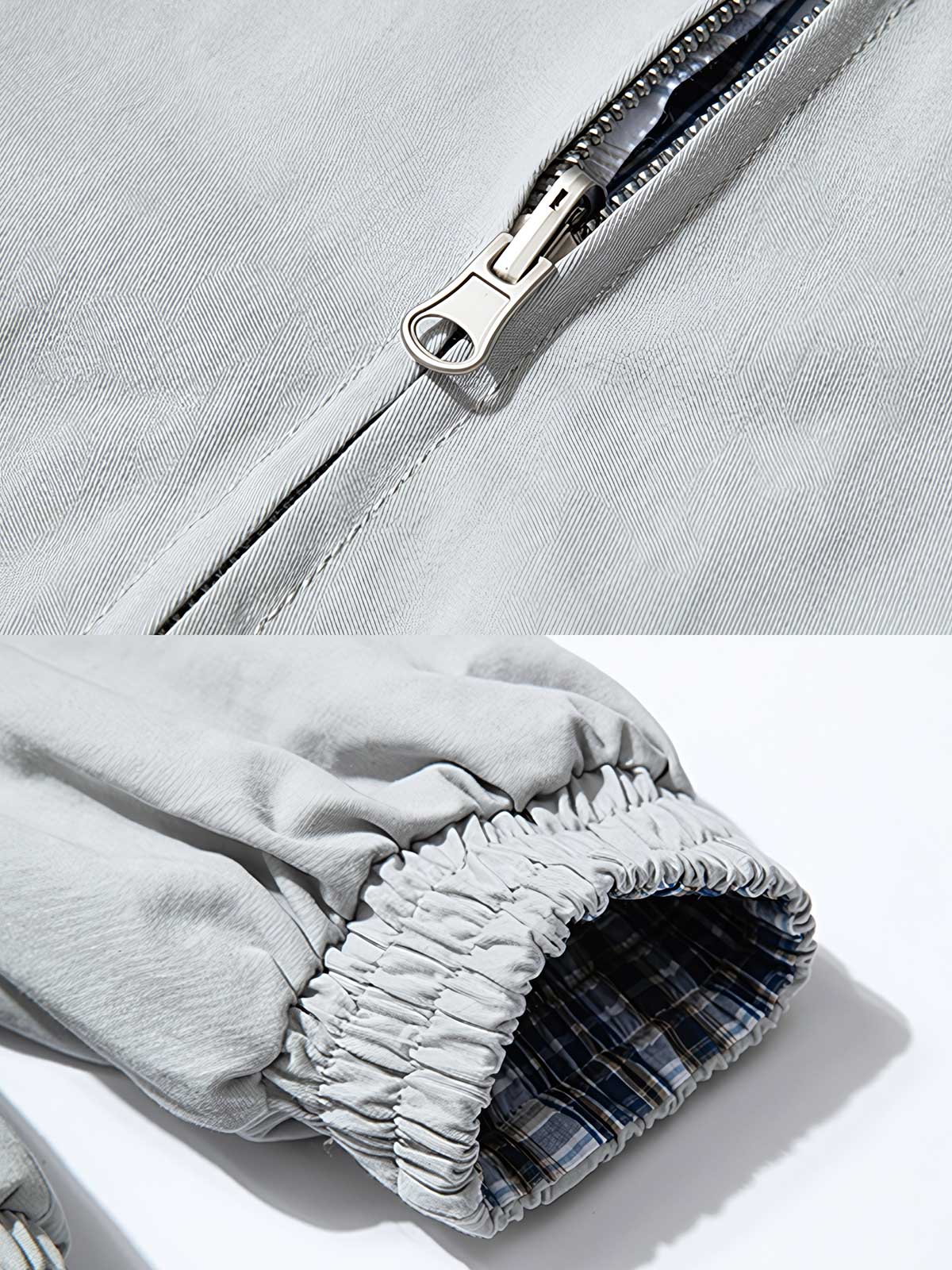 製品画像: このリバーシブルデザインのレトロスタンドカラーチェック柄ハリントンジャケットは、100%コットン素材で作られ、ジッパー付きデザインとスタンドカラーが特徴で、クラシックなルックと快適さを提供する一着です。
詳細画像: このジャケットの詳細な画像には、チェック柄と無地のリバーシブルデザインがしっかりと反映されており、スタンドカラーのディテール、ジッパー付きのデザイン、リブ袖口と風防デザインが見事に融合して、機能性とデザイン性を兼ね備えた仕上がりとなっています。また、内側のチェック柄ディテールも鮮明に見えるクローズアップで、品質感を際立たせています。