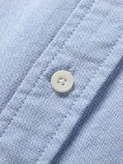 詳細画像:斜めジッパーポケットとラウンドヘムのディテール