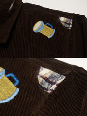 コットン刺繍とレザーパッチのディテール特写