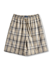 タータンチェック柄とドローストリングが特徴のワイドショーツ前面全体