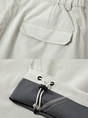 製品画像: アウトドアハイキングシェルパンツ全体展示 - アウトドアやスポーツに最適な機能的なデザイン。
詳細画像: 異形カッティングとジップポケットのディテール展示 - 立体感のあるビジュアルと収納力。