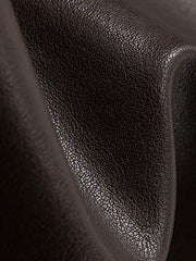 製品画像: アメカジ風 ワイドシルエット PUレザージャケット 秋冬用 ユニセックスの正面展示
詳細画像: ダブルジップポケットとゴム入り裾のディテール