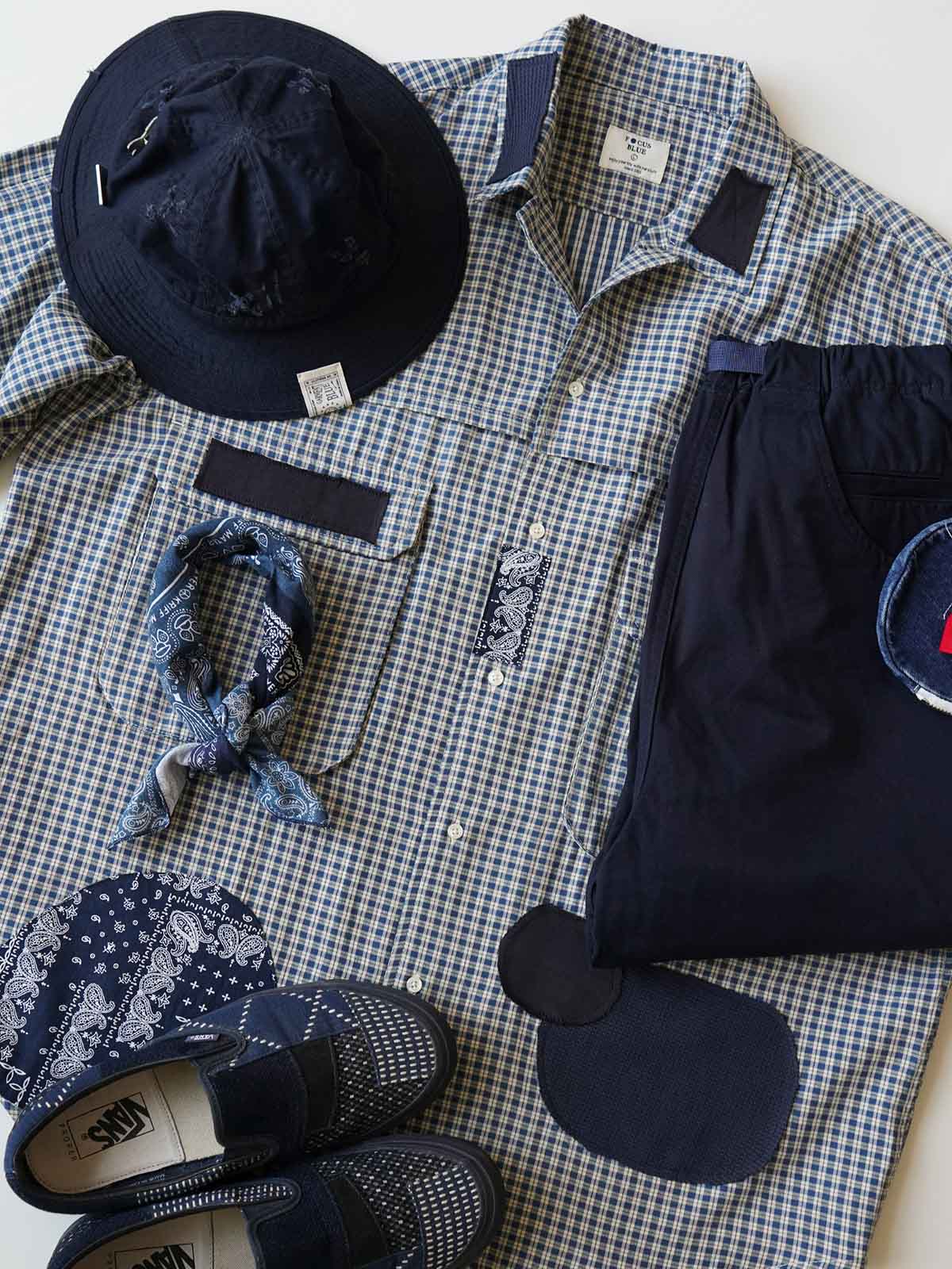 製品画像
ボロパッチワーク ワークシャツ全体デザイン。ペイズリー柄やヴィンテージニット生地を大胆に取り入れた複雑なパッチワークデザインが特徴。チェック柄と無地素材の質感コントラストが際立つルーズフィットのシルエット
詳細画像
ダブルチェストポケットや肩部分の二重構造のディテール、3cmあたり18針の高密度ステッチが丁寧に仕立てられた特写。耐久性と立体感を両立した洗練された仕上がり