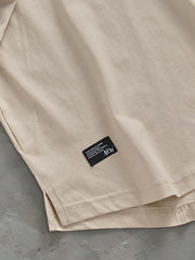Tシャツのラグランスリーブとカーブヘムの詳細