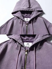 製品画像
「ウォッシュ加工によるヴィンテージ感漂うフード付きワークジャケット正面展示図。レトロな風合いと実用性が融合し、ダブルポケットとフードデザインが特徴的な一着。」
詳細画像
「ゴム仕様の袖口ディテールとウォッシュ加工による質感の特写。袖口のゴムが防風性と保温性を向上させ、ヴィンテージ風の仕上がりが際立つ。」