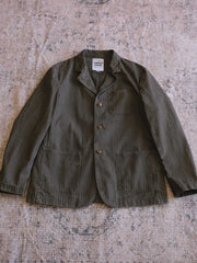 製品画像: ヴィンテージヘリンボーンウォッシュジャケットの全体画像、独特な時代感を持つデザイン
詳細画像: ウォッシュ加工されたヘリンボーン柄の生地とヴィンテージメタルボタンのディテール