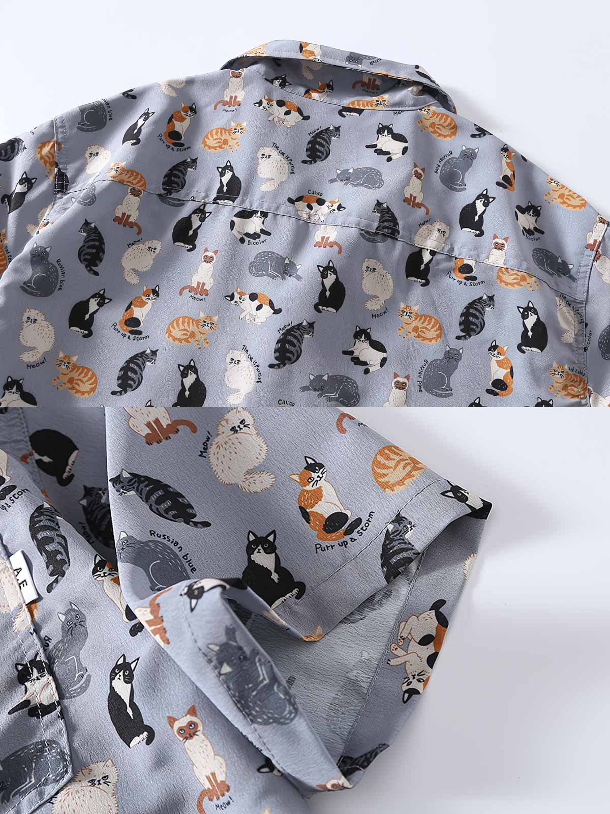 猫の柄のディテールが特徴のキューバカラーシャツのクローズアップ。色とりどりの猫が表現され、独特の楽しい雰囲気を提供。