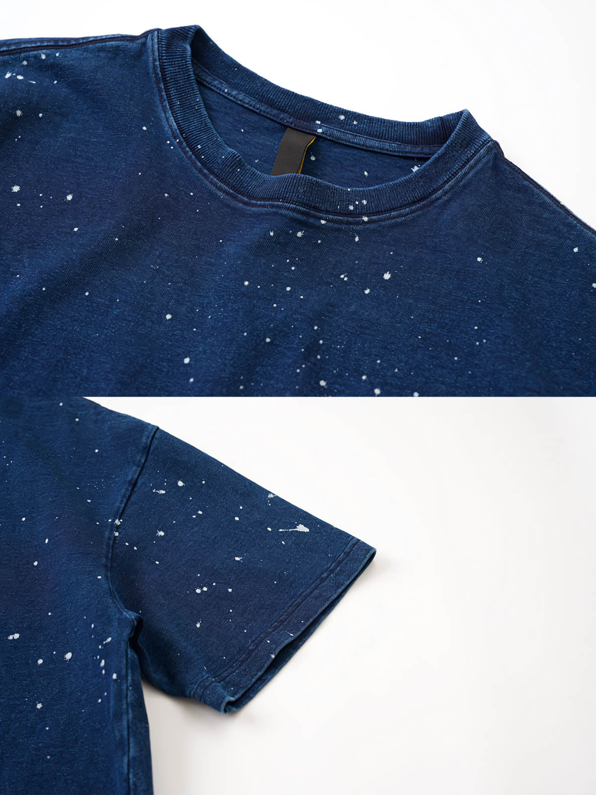 ディテールクローズアップ:スノーフレークプリントが特徴的なインディゴ染め半袖Tシャツの職人技が感じられるプリントと生地