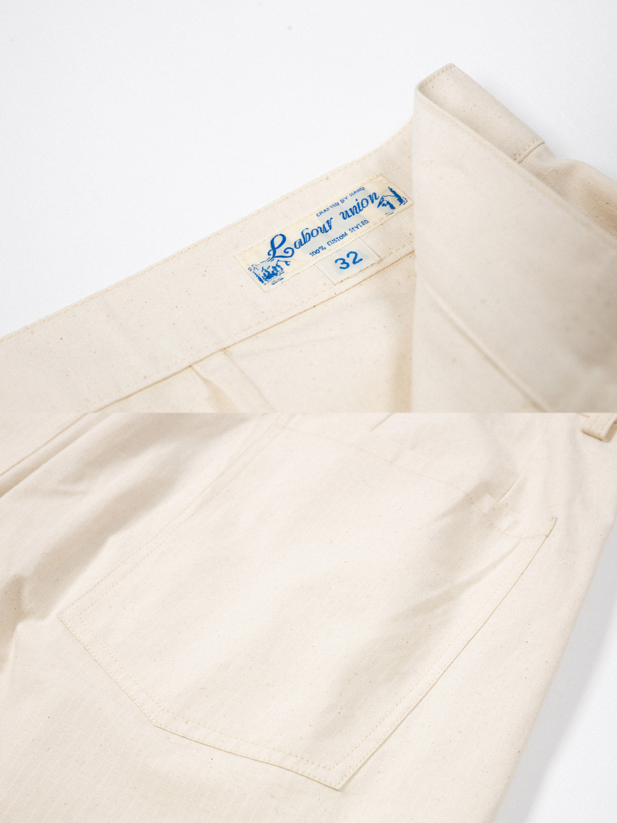 パンツのハイウエストデザインとフルーツボタンのディテール