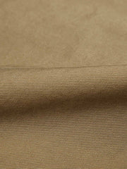 製品画像
リバーシブル仕様のトラ刺繍ワークシャツ全体デザイン。片面には胸元に精緻なトラ刺繍、もう片面には竹林に佇むトラのデザインが施された、オリエンタルデザインとミリタリースタイルが融合したシャツ
詳細画像
胸元に施されたトラ刺繍と銅製ボタンのディテール特写。蘇繍(ソシュウ)の伝統技法による繊細なステッチと、クラシックなミリタリーグリーンキャンバス素材の質感が特徴