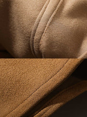 製品画像: カーキ色のスエード調ウエスタンシャツの正面展示
詳細画像: ビーズ装飾と狼モチーフのディテール展示