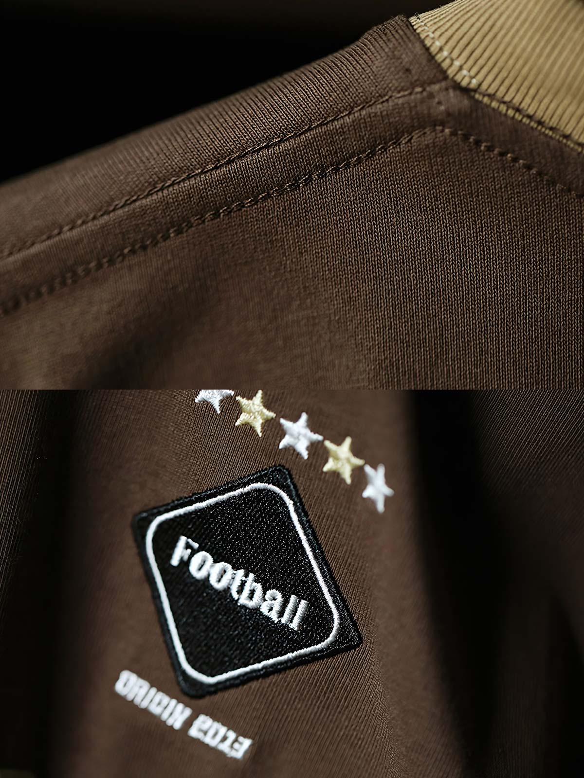 Tシャツの発泡プリントと高密度のサテンステッチ刺繍のクローズアップ