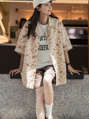 モデル画像:モデルが着用した彩絵ルアープリント キューバシャツの展示