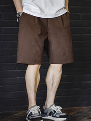 モデル画像:モデルが立体チェックワイドシルエットショーツを着用