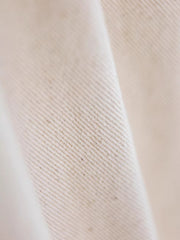 ナチュラルコットンの原色とコットンシードハスクのテクスチャー特写