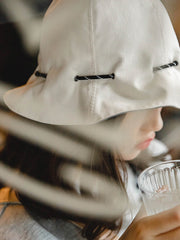 両面使えるバケットハットとポータブル小銭入れ