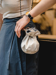 両面使えるバケットハットとポータブル小銭入れ