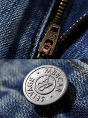 デニムパンツのパッチワークディテールと五金パーツ