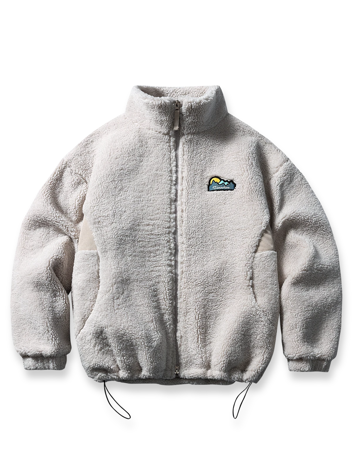 製品画像
「レトロフリース スタンドカラージャケット全体像。厚手フリース素材とスタンドカラーデザインが特徴で、快適さと暖かさを兼ね備えたルーズフィットジャケット」
詳細画像
「フリーススタンドカラージャケットの刺繍デザインとドローコード付き裾の調整可能なディテール。レトロなデザインと実用性を融合」