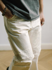 破れ刺繍ルーズフィットジーンズ