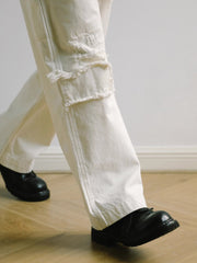 破れ刺繍ルーズフィットジーンズ