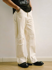 破れ刺繍ルーズフィットジーンズ