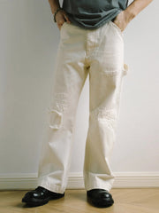 破れ刺繍ルーズフィットジーンズ