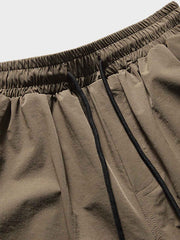 裾絞り 立体ポケット付きスラックス