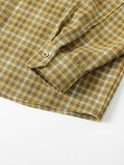 製品画像
「レトロなアメカジスタイルのチェック柄長袖シャツ全体の展示図。クラシックなチェック柄デザインとリラックス感のある着心地を提供するアイテム。アースカラーを取り入れたカラーリングが多様なボトムスとの相性抜群で、日常的なカジュアルスタイルに最適。」
詳細画像
「胸元のパッチポケットとチェック柄のディテール特写。ウォッシュ加工により、自然なヴィンテージ感を表現したデザインが特徴的。しっかりとした中厚生地が、着心地と耐久性を両立させています。」
