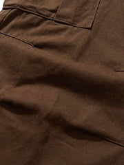 製品画像
ウォッシュドクラッシュ加工カーゴパンツ、ヴィンテージ感のあるクラッシュデザイン、精緻な水洗い加工で柔らかな生地感、カジュアルでストリート感を強調、実用的な大きなポケットがアクセント
詳細画像
ウォッシュドクラッシュ加工によるヴィンテージスタイル、柔らかなコットン生地、シンプルなストレートカットシルエット、大きなポケットが特徴的で実用性が高い、リラックスしたカジュアルスタイルに最適