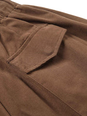 製品画像: ドローストリング付きベーシックワイドパンツのフロントビュー、シンプルなデザイン。
詳細画像: ドローストリングのデザインディテール、100%コットン素材の質感が確認できる。