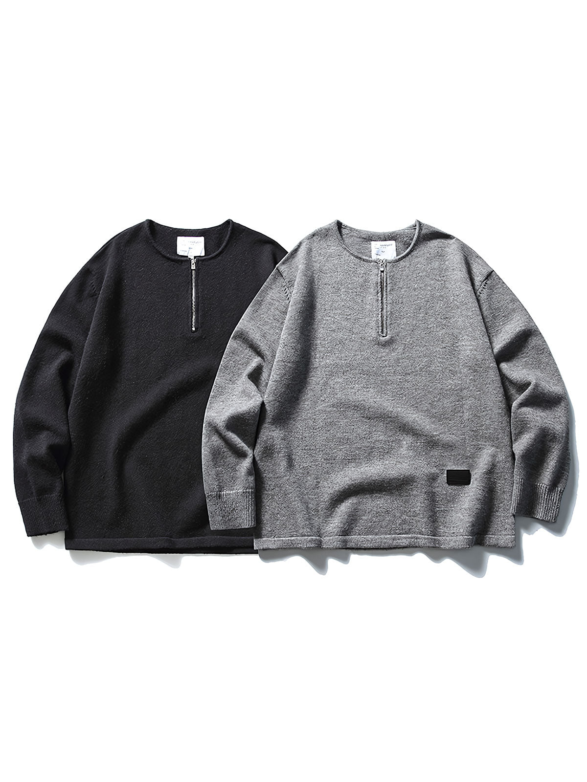 製品画像ALT代替テキスト
ヴィンテージ風ゆったりニットスウェットシャツ、ラウンドネックとハーフジップデザインの全体展示。
詳細画像ALT代替テキスト
ハーフジップディテールと袖口デザインが際立つニットスウェットシャツのディテール。