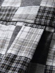 製品画像: ブラック&ホワイトのチェック柄カジュアルシャツの正面展示
詳細画像: シャツの襟とチェック柄のディテールクローズアップ