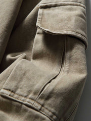 製品画像: レザーカラーワークジャケットの正面展示
詳細画像: ジャケットのレザー襟とジップポケットのディテール展示