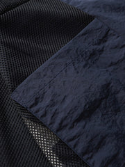 製品画像: 防水・リフレクター付き100%ナイロントレンドスポーツジャケット全体画像。アウトドアや日常使いに適したデザインで、防水性能とリフレクターデザインが際立ちます。
詳細画像: 夜間の安全性を高めるリフレクターデザインと、スタイリッシュな配色のディテールクローズアップ。防水機能とトレンド感を両立した高性能ジャケット。