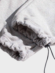 裾絞り 刺繍入り スウェットパンツ