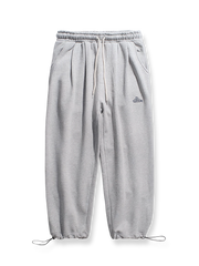 裾絞り 刺繍入り スウェットパンツ